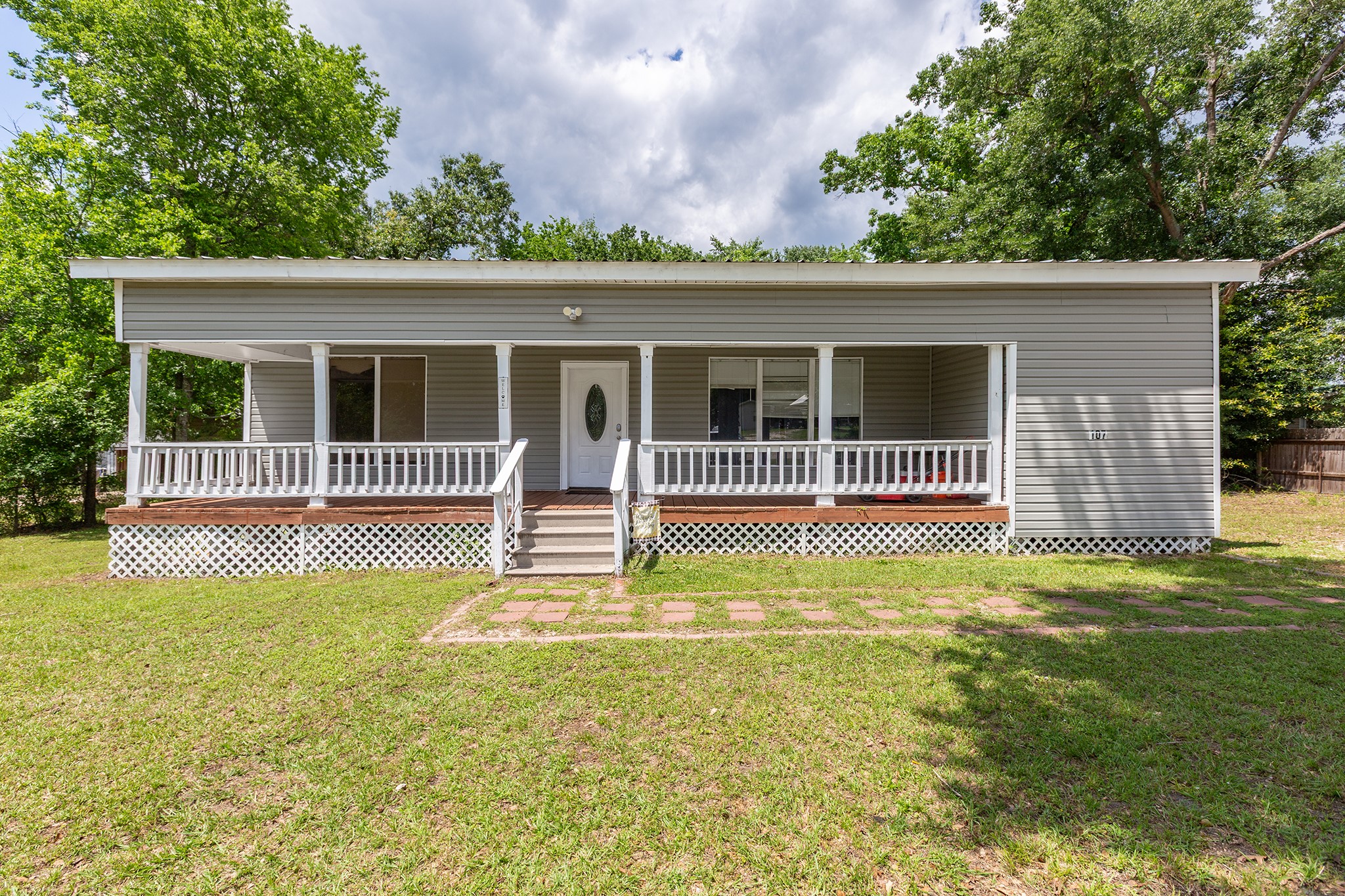 240 North 7th Street Trinity, TX 75862 - Photo 6 of 32 a view of a house with a swimming pool