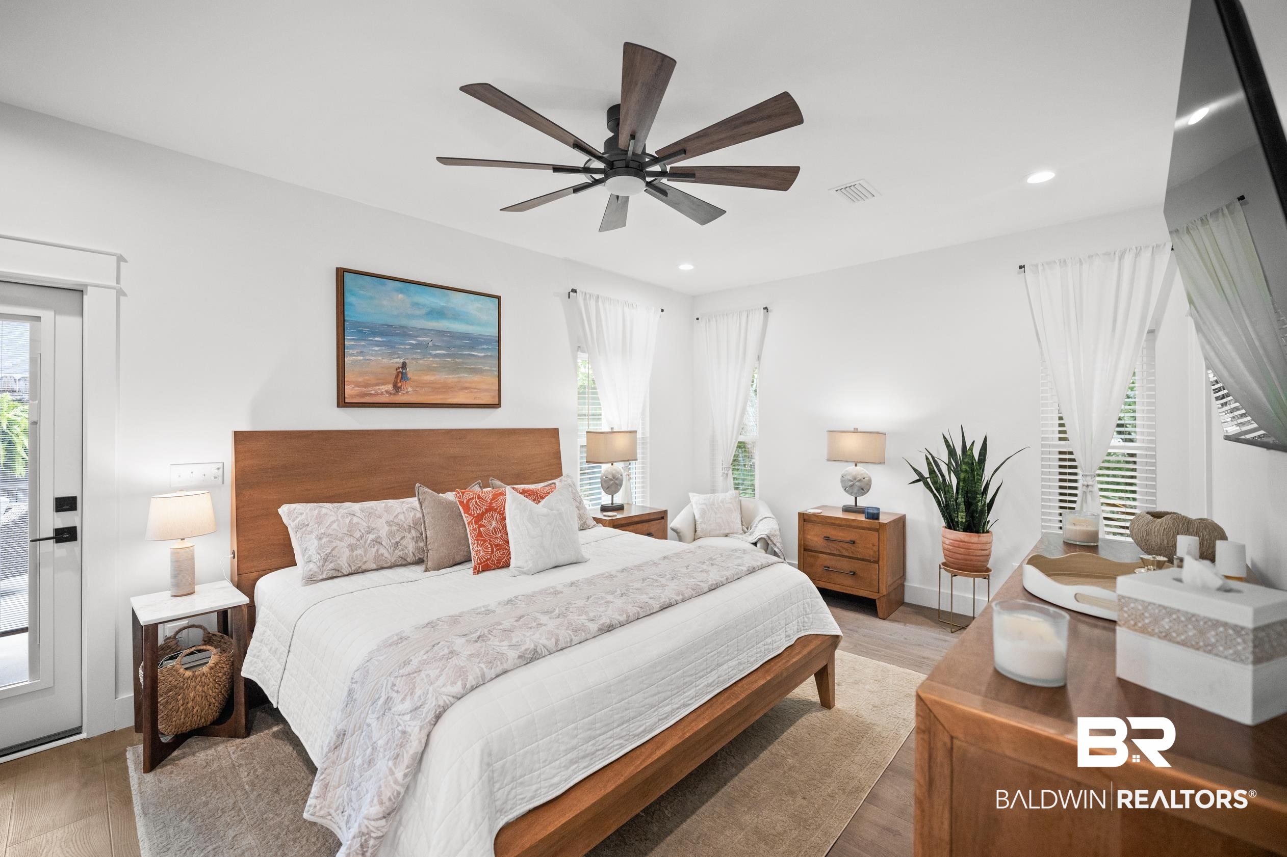 5501 Mobile Avenue Orange Beach, AL 36561 - Photo 10 of 40 Bedroom with wood finished floors, multiple windows, recessed lighting, and a ceiling fan