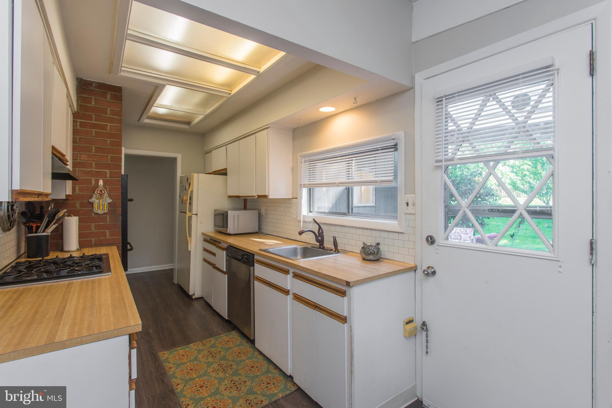 817 Church Road Wyncote, PA 19095 - Photo 8 of 28 Kitchen to outdoor patio