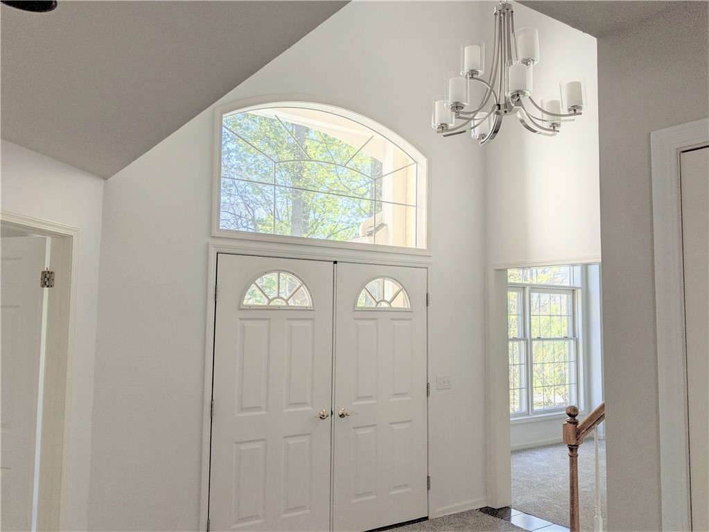 41 Hawks View Mendon, NY 14472 - Photo 11 of 46 2 story foyer - new chandelier is a larger version