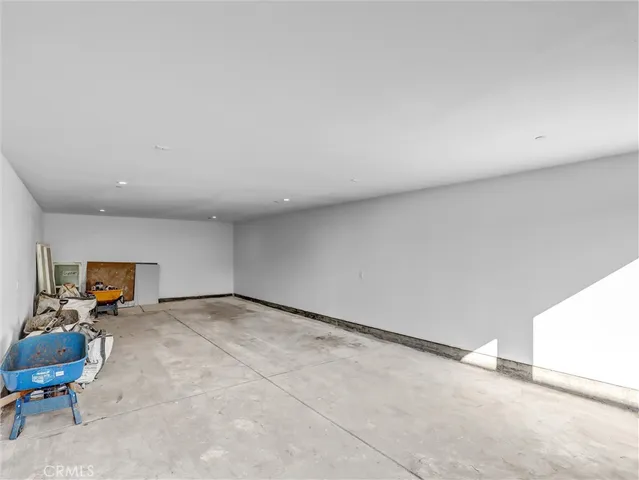 a view of a hallway with entryway door