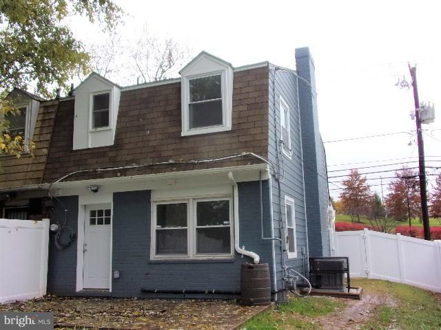 8012 Sheriff Road Landover, MD 20785 - Photo 23 of 24 a view of a house with a door and a yard