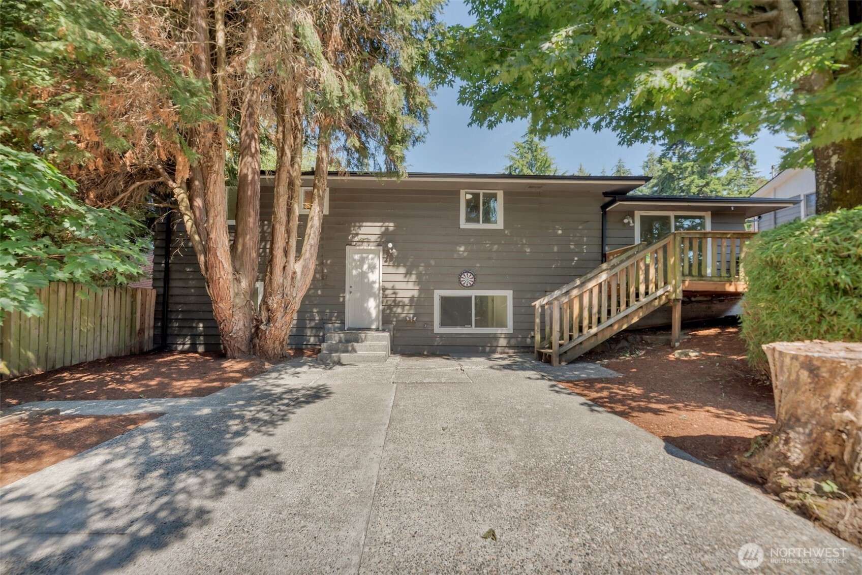 11229 29th Avenue Southwest Seattle, WA 98146 - Photo 25 of 28 front view of a house with a yard