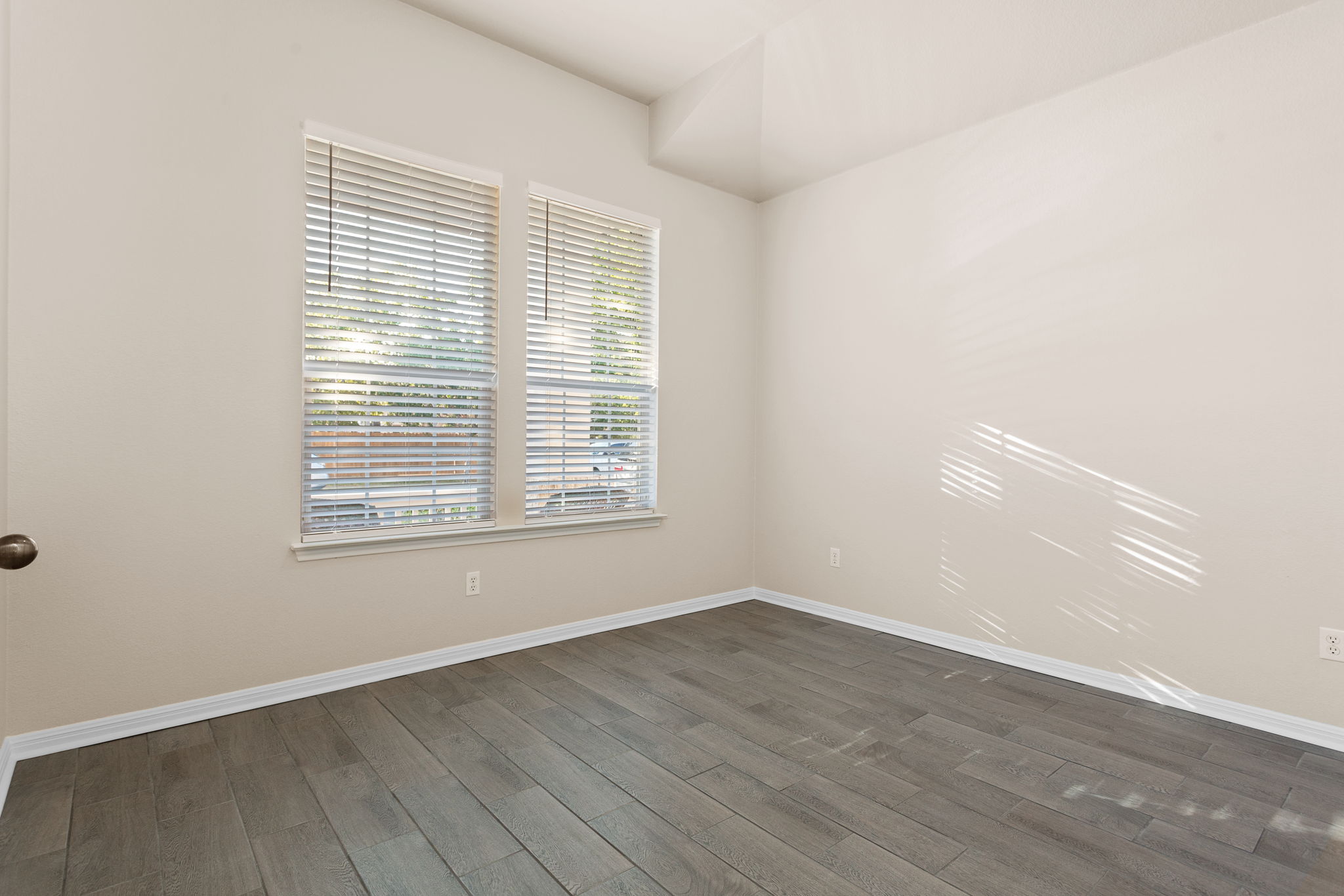 313 Greenside Lane Georgetown, TX 78633 - Photo 28 of 40 Spare room featuring dark wood finished floors and baseboards