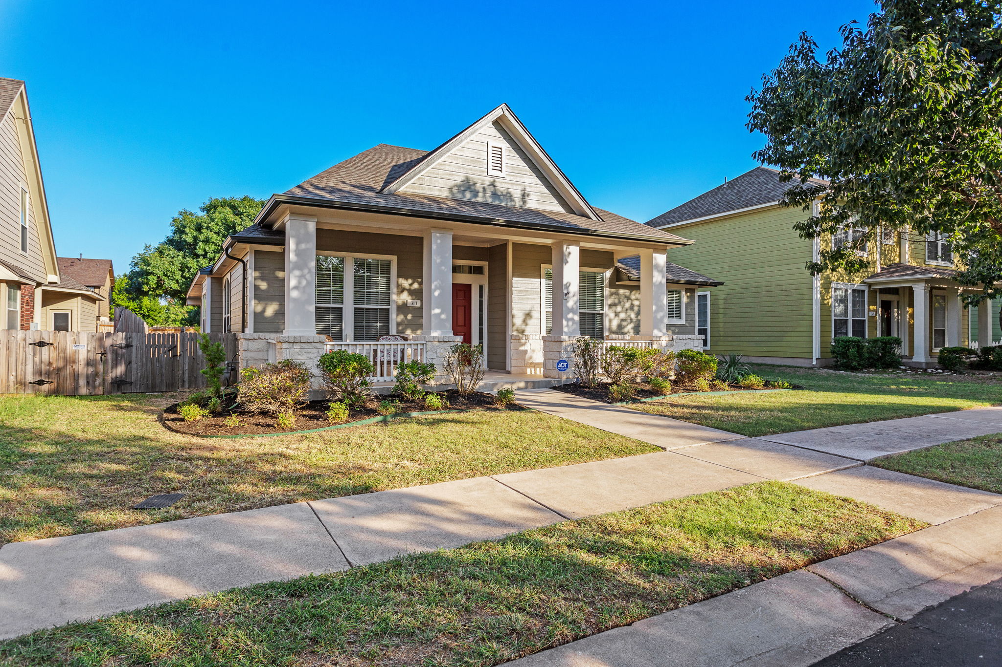 313 Greenside Lane Georgetown, TX 78633 - Photo 6 of 40 View of front of home with covered porch and a shingled roof