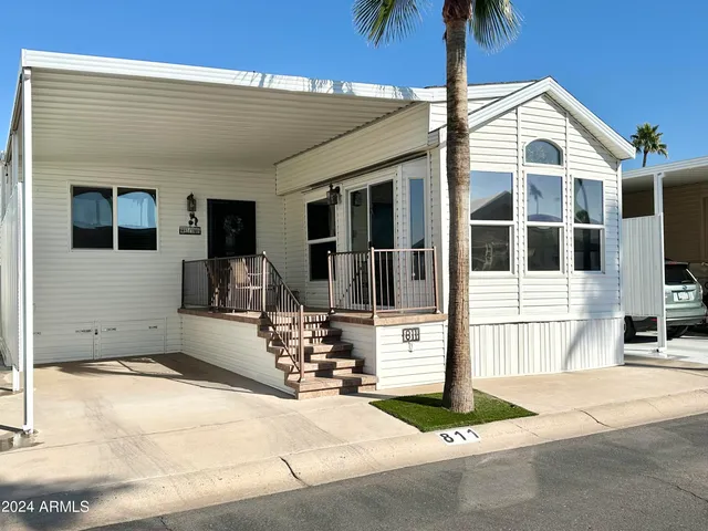 a front view of a house with a patio