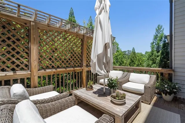 a view of a balcony and wooden floor