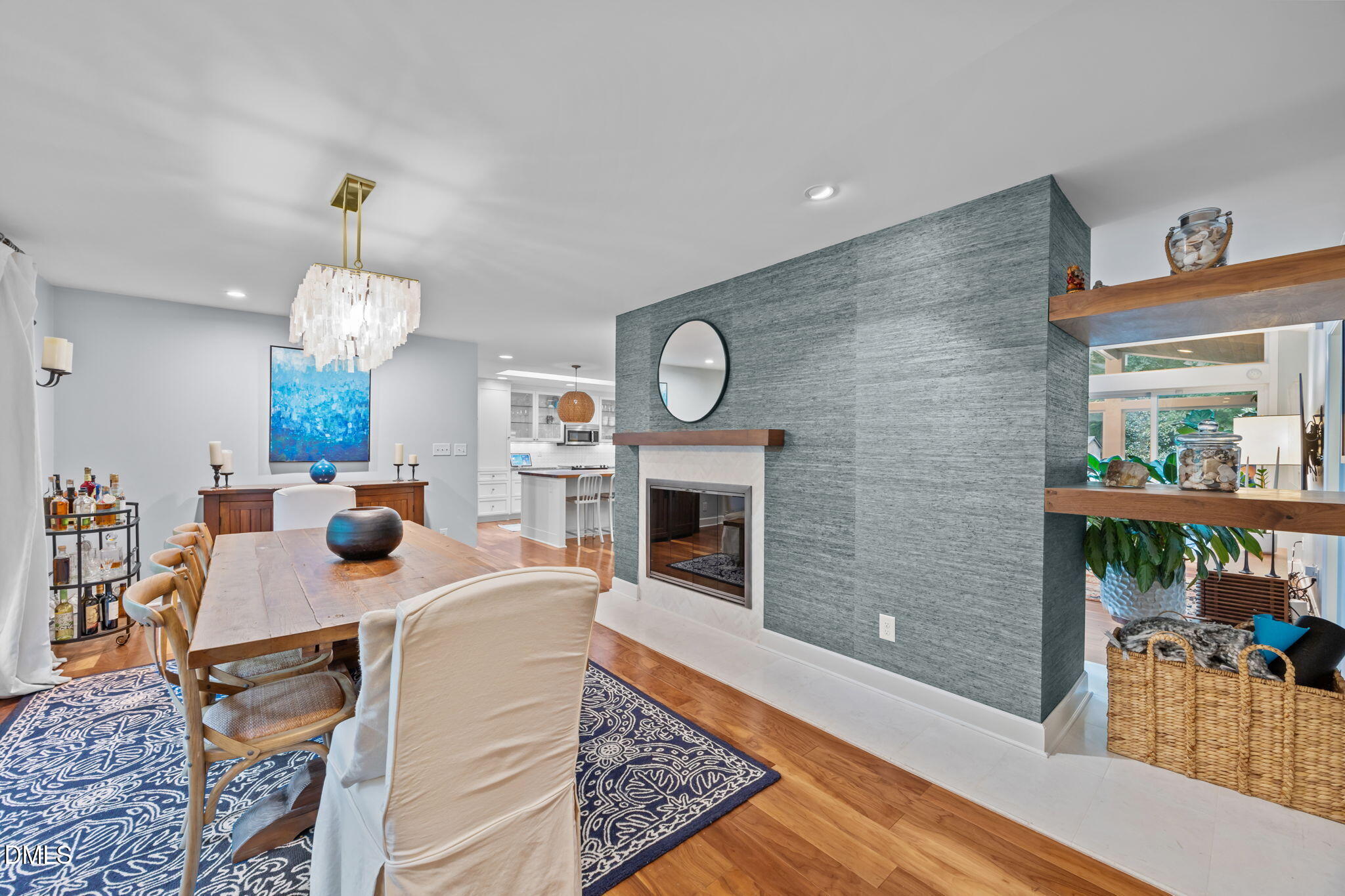1812 Rolling Road Chapel Hill, NC 27514 - Photo 15 of 72 a view of a dining room with furniture window and wooden floor