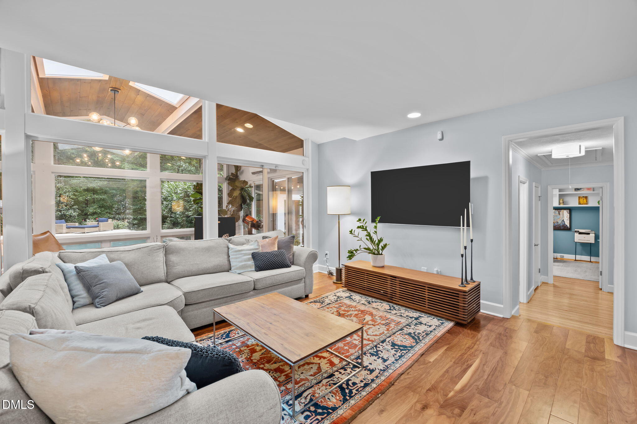 1812 Rolling Road Chapel Hill, NC 27514 - Photo 22 of 72 a living room with furniture and a flat screen tv