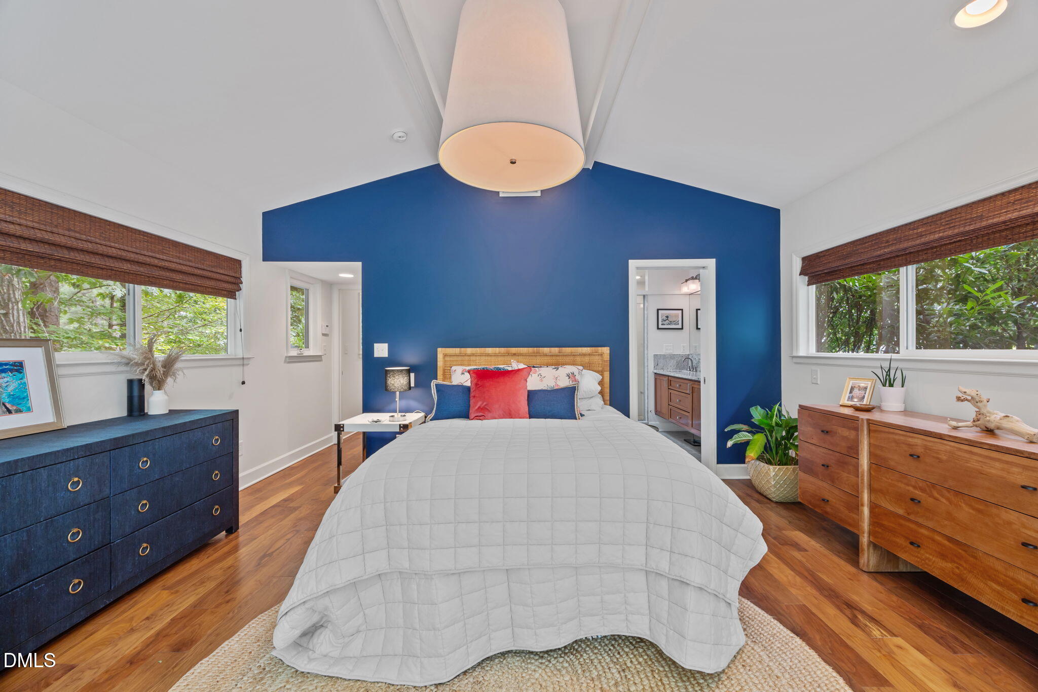 1812 Rolling Road Chapel Hill, NC 27514 - Photo 29 of 72 a bedroom with a large bed and a window
