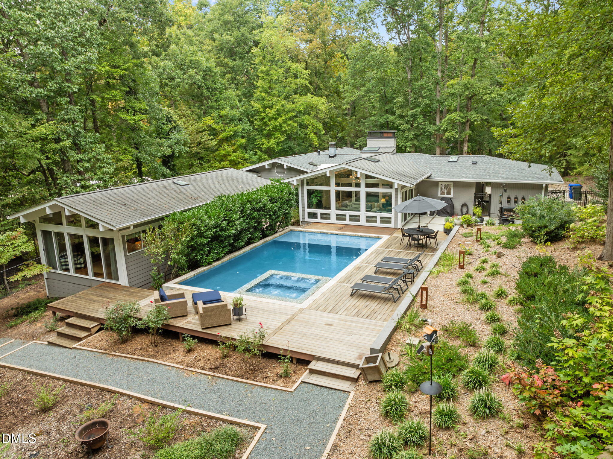 1812 Rolling Road Chapel Hill, NC 27514 - Photo 2 of 72 an aerial view of a house with swimming pool