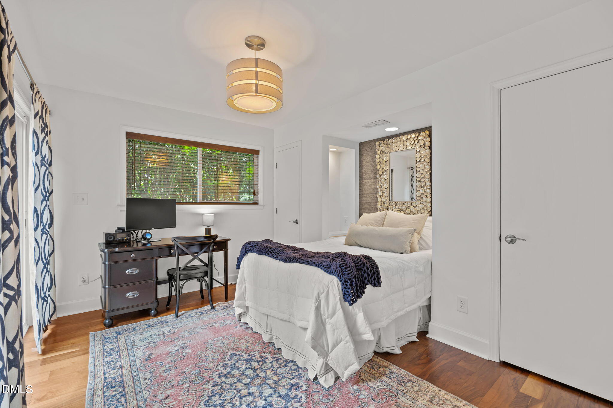 1812 Rolling Road Chapel Hill, NC 27514 - Photo 34 of 72 a bedroom with furniture and a window