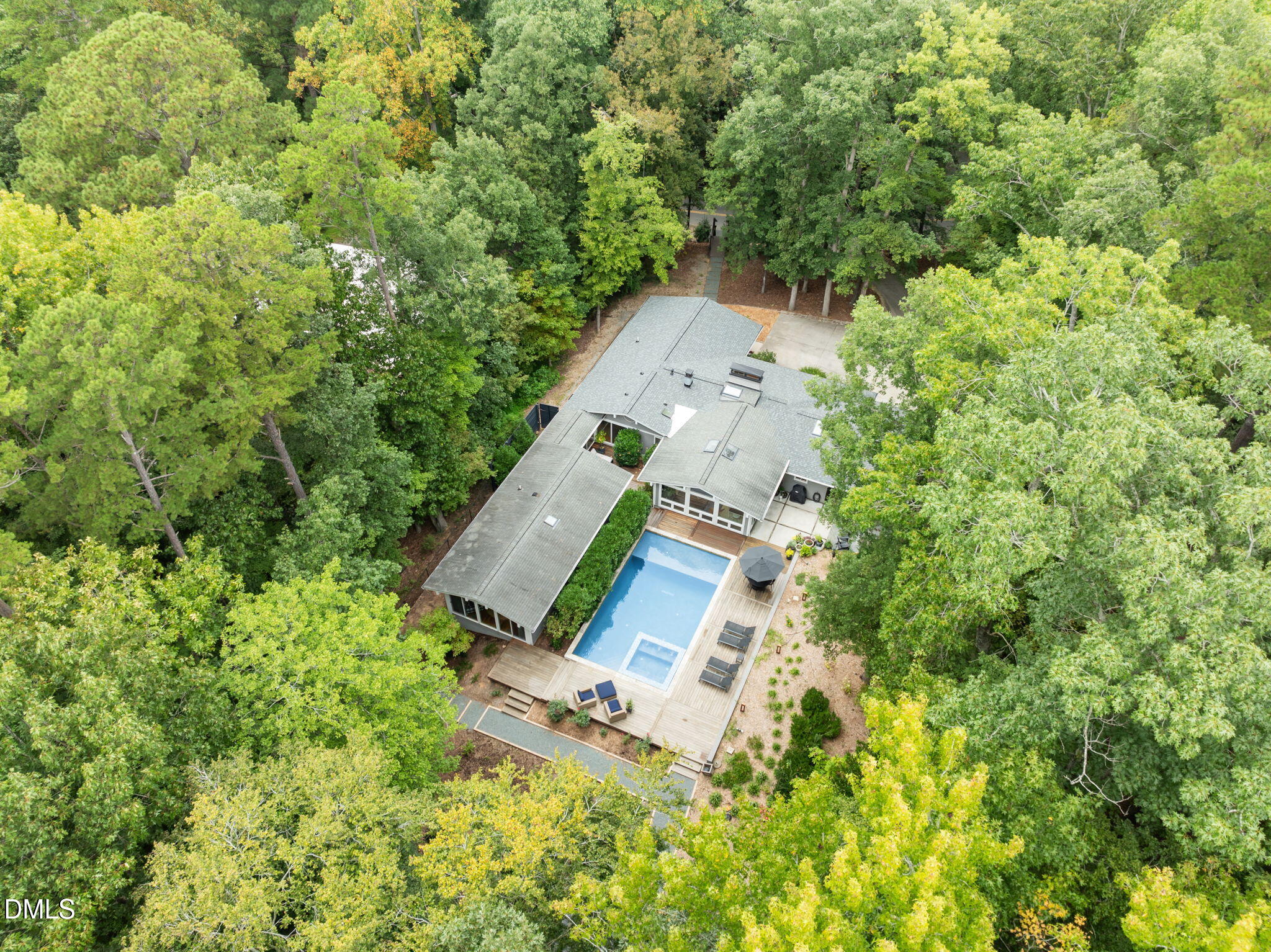 1812 Rolling Road Chapel Hill, NC 27514 - Photo 47 of 72 an aerial view of a house with a yard and garden