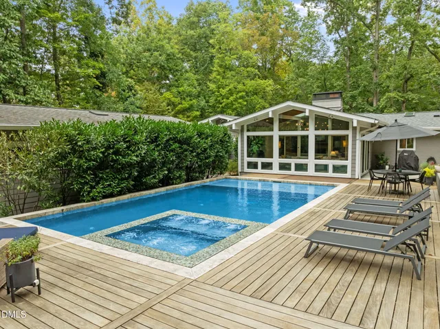 a view of a swimming pool with a patio