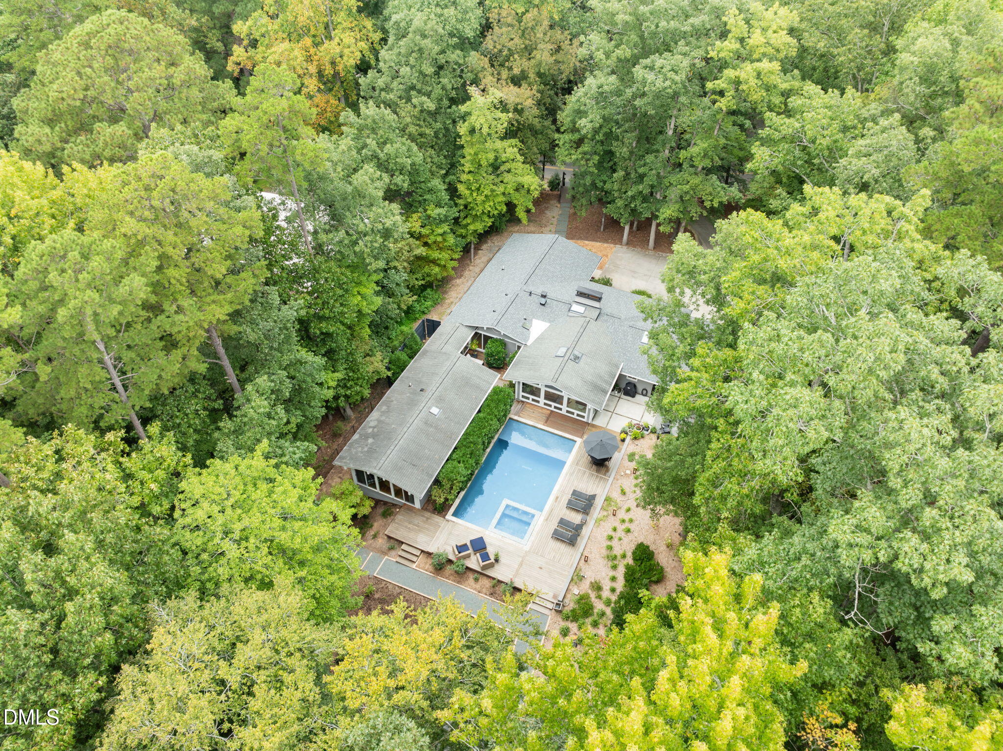 1812 Rolling Road Chapel Hill, NC 27514 - Photo 64 of 72 an aerial view of a house with a yard and garden