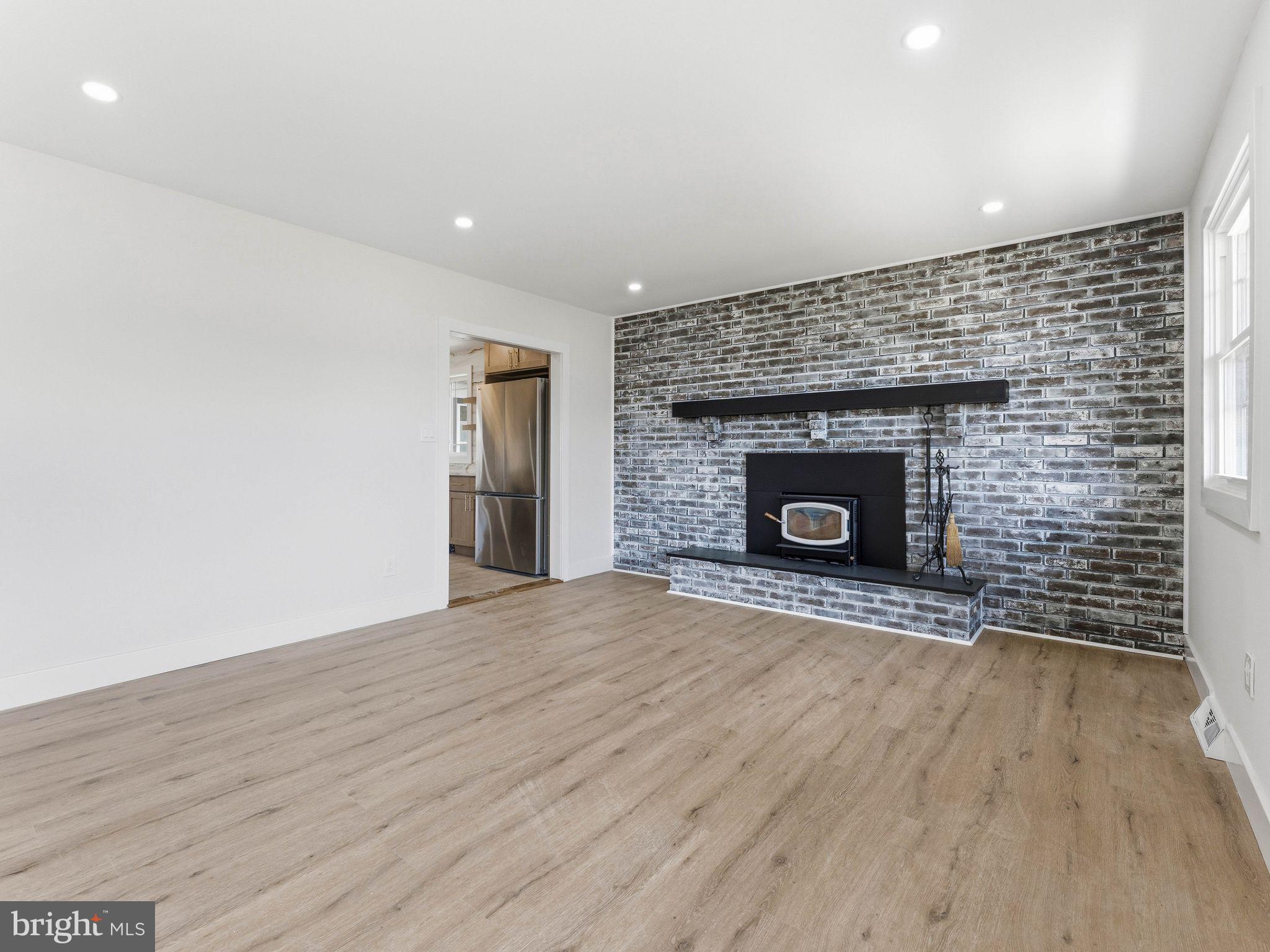 513 Jefferson Street Riverside, NJ 08075 - Photo 6 of 29 Modern space with stylish brick accent.
