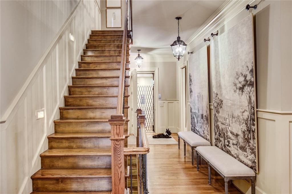 1005 Heards Ferry Road Northwest Sandy Springs, GA 30328 - Photo 12 of 30 a view of entryway and hall with wooden floor