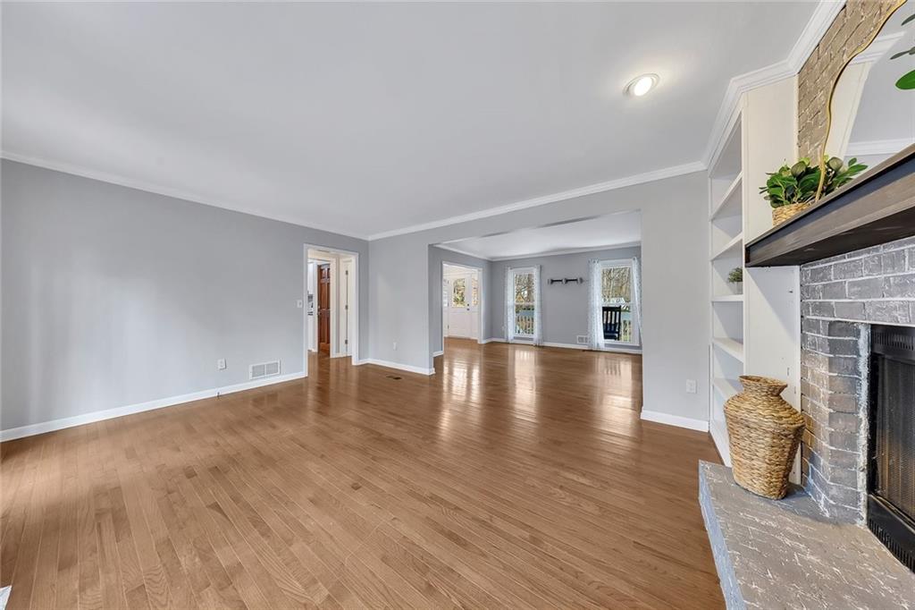 507 Spring Creek Way Northeast Marietta, GA 30068 - Photo 13 of 50 a view of livingroom and hardwood floor