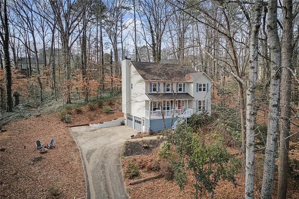 507 Spring Creek Way Northeast Marietta, GA 30068 - Photo 2 of 50 a view of a house with a yard
