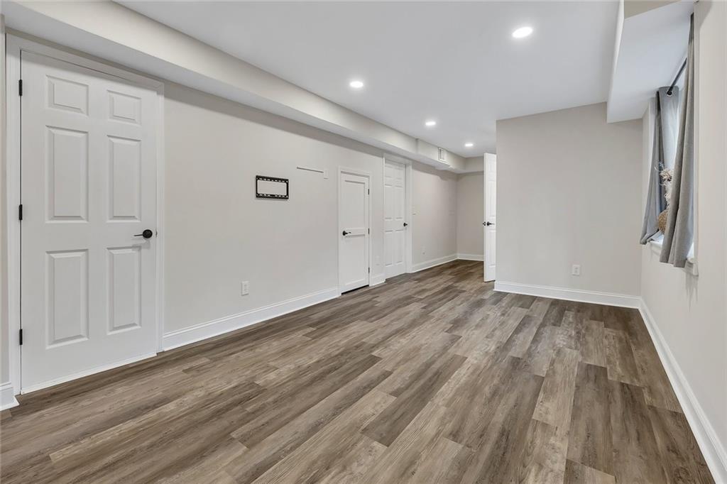 507 Spring Creek Way Northeast Marietta, GA 30068 - Photo 34 of 50 a view of hallway with wooden floor