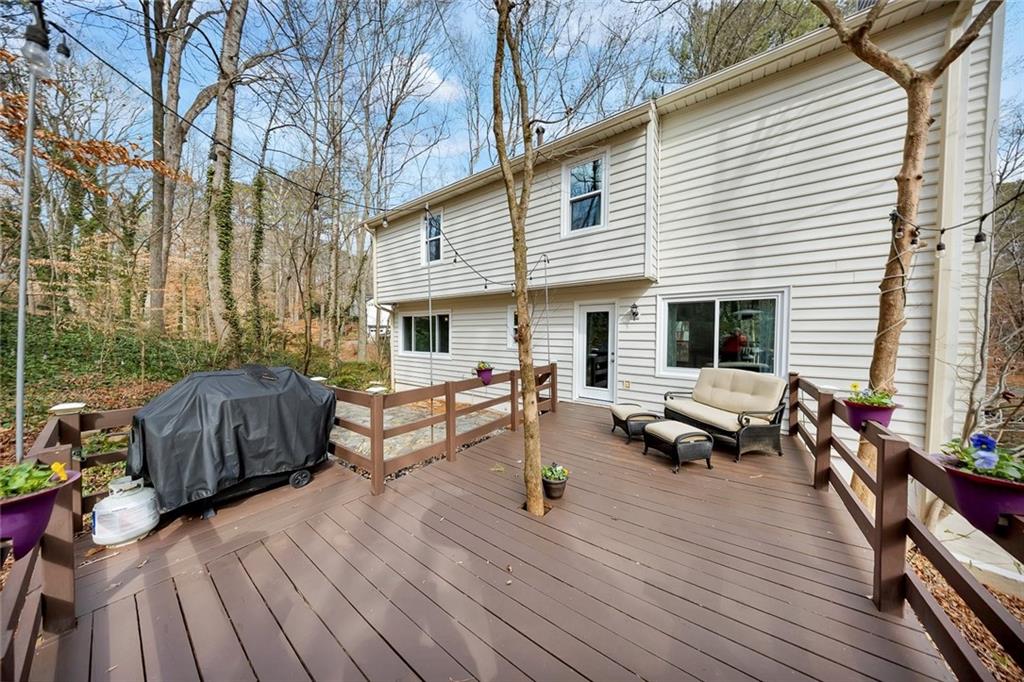 507 Spring Creek Way Northeast Marietta, GA 30068 - Photo 38 of 50 a view of a house with backyard and sitting area