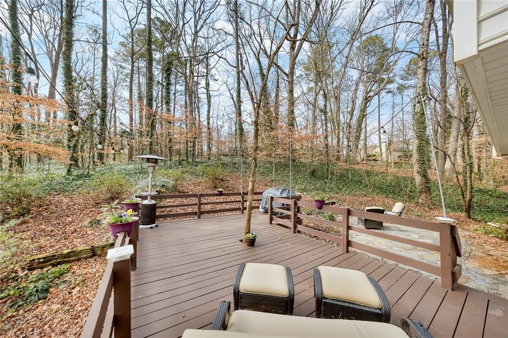 507 Spring Creek Way Northeast Marietta, GA 30068 - Photo 39 of 50 swimming pool with outdoor seating and green space