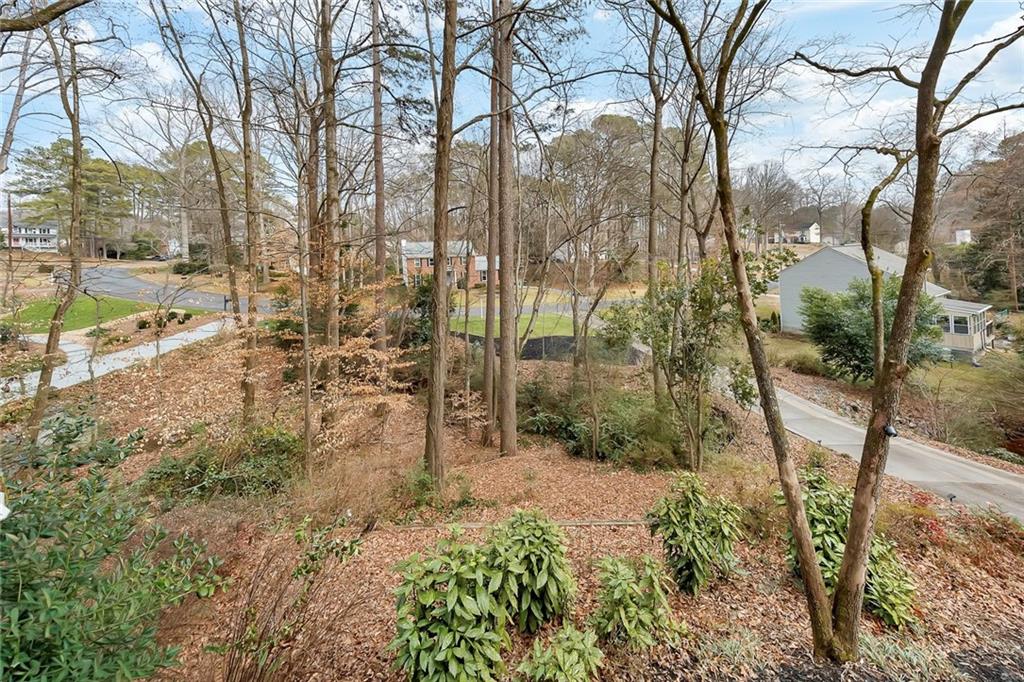 507 Spring Creek Way Northeast Marietta, GA 30068 - Photo 40 of 50 a view of a pathway with a yard