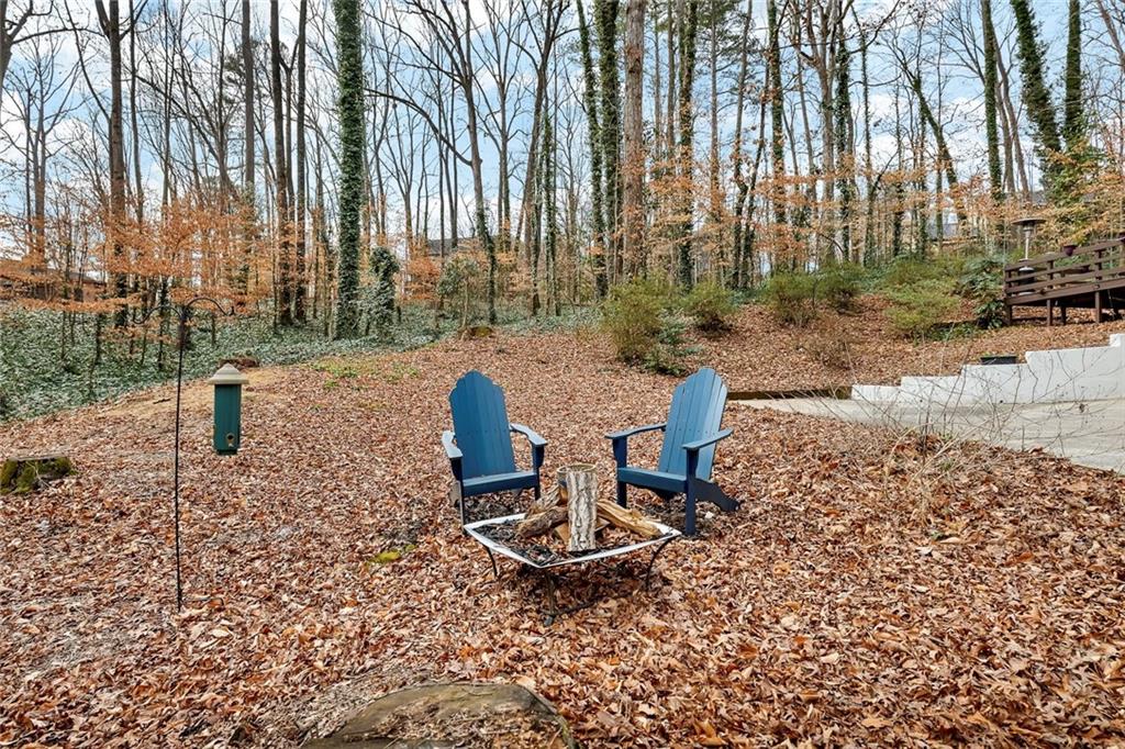 507 Spring Creek Way Northeast Marietta, GA 30068 - Photo 41 of 50 a view of a backyard with sitting area