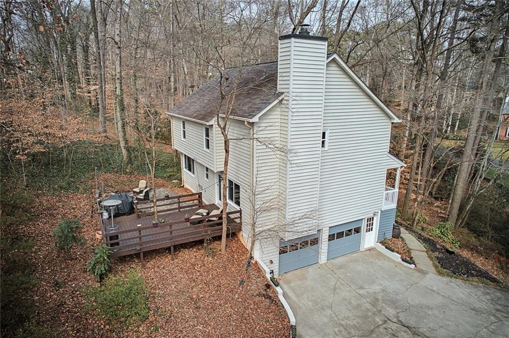 507 Spring Creek Way Northeast Marietta, GA 30068 - Photo 46 of 50 a view of a house with backyard and sitting area