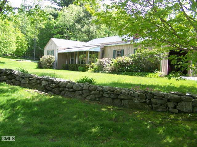 315 Cathole Road Litchfield, CT 06759 - Photo 1 of 1 a front view of house with yard and green space