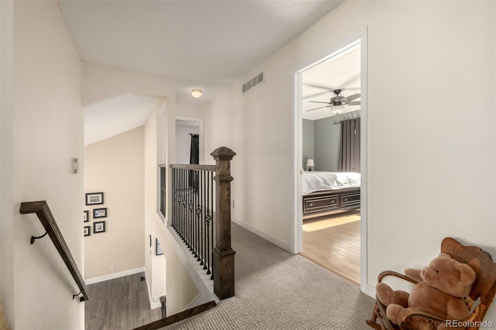 8894 Miners Street Highlands Ranch, CO 80126 - Photo 14 of 41 a view of livingroom with furniture and stairs