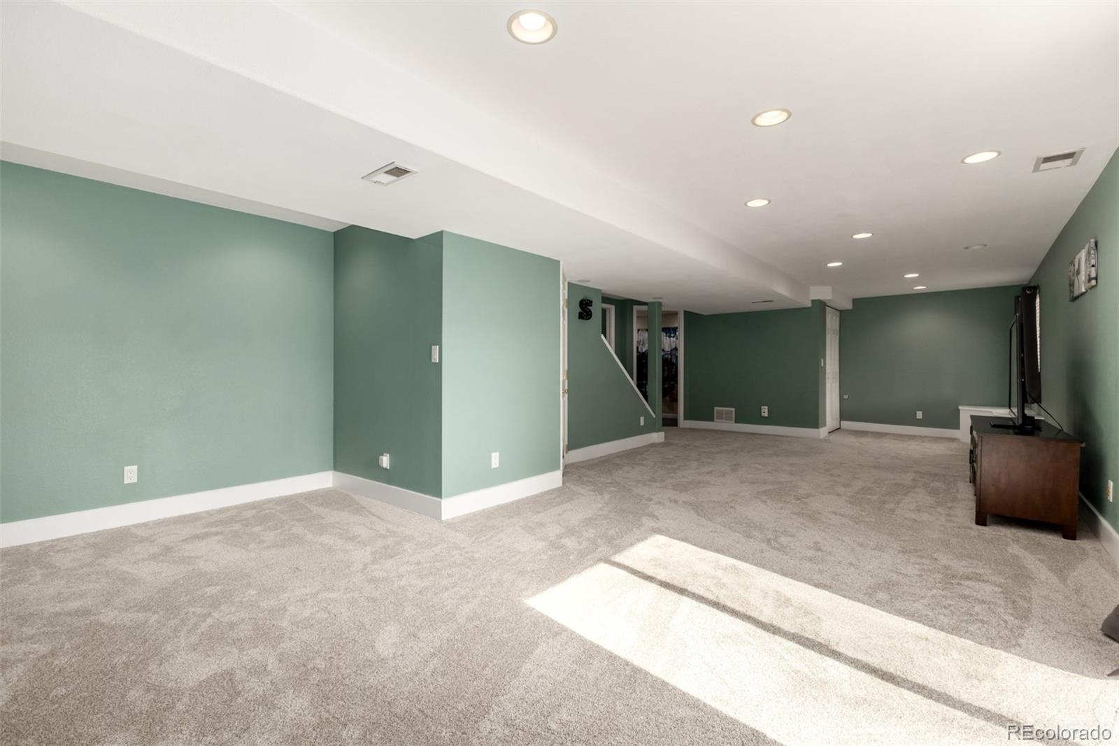 8894 Miners Street Highlands Ranch, CO 80126 - Photo 29 of 41 a view of livingroom with workspace