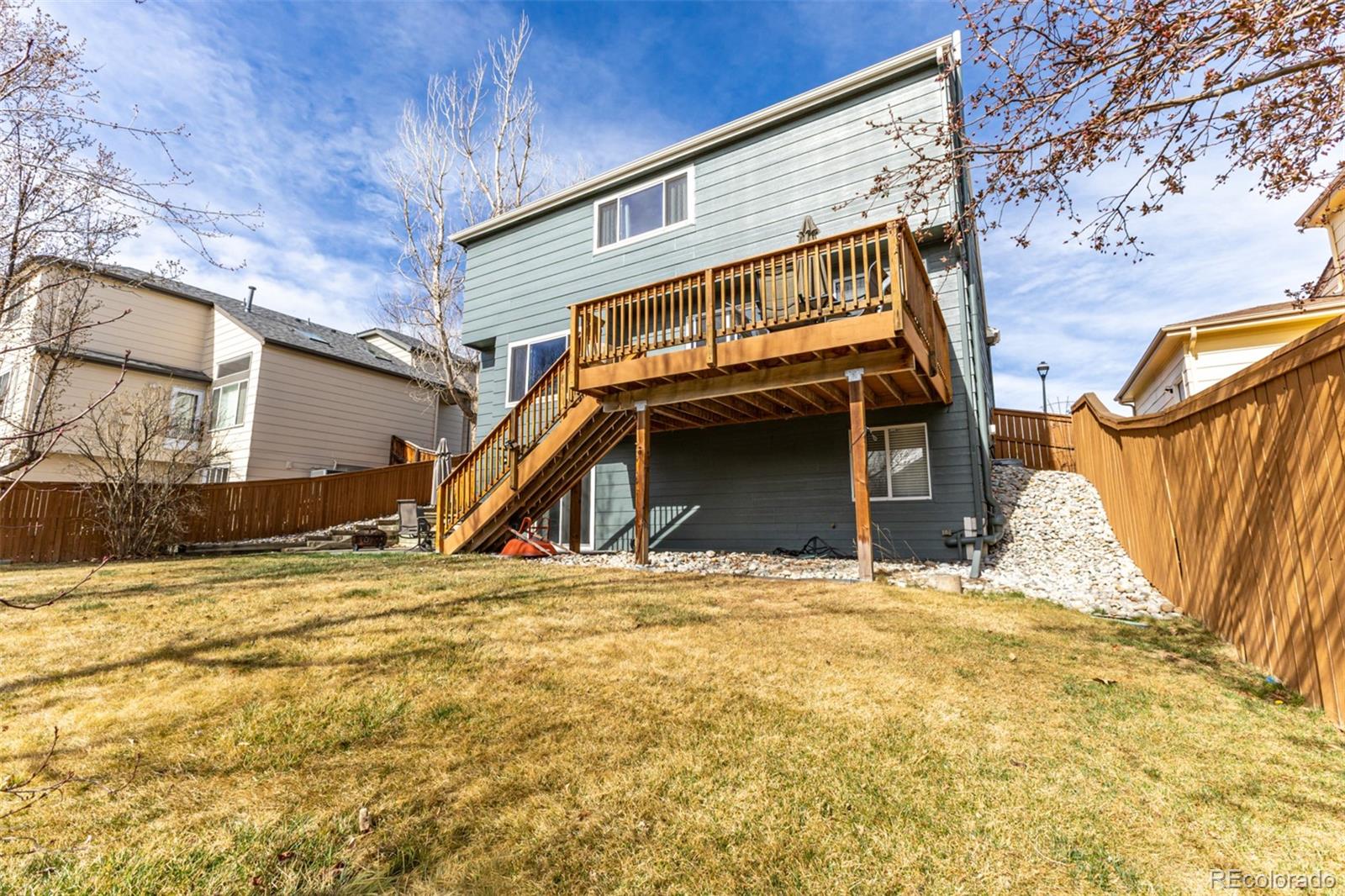 8894 Miners Street Highlands Ranch, CO 80126 - Photo 36 of 41 a view of a house with snow on the wall