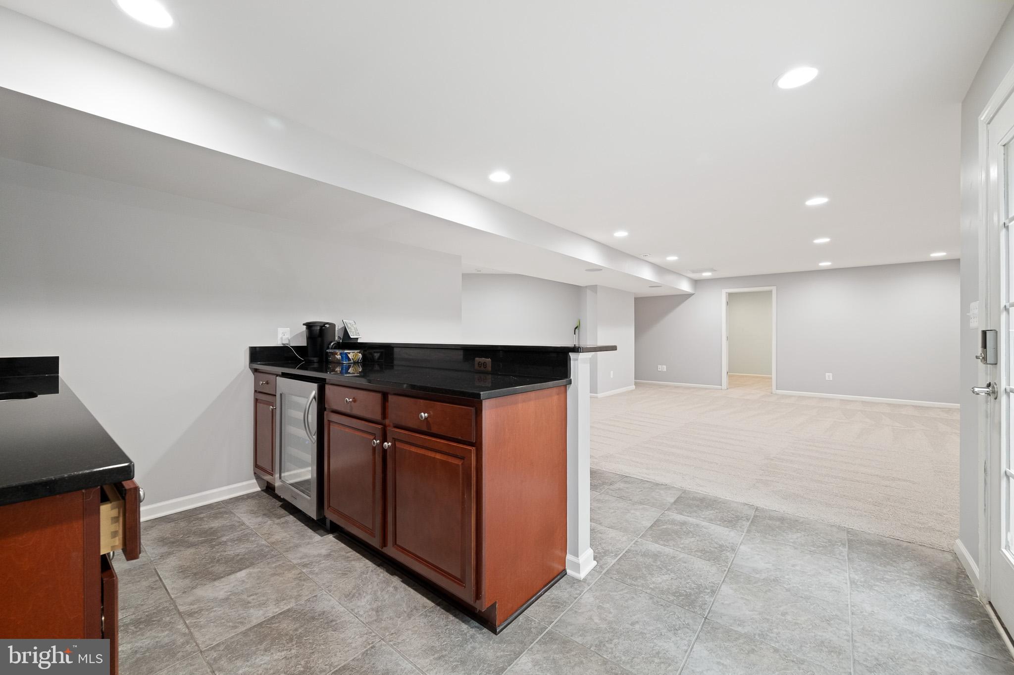 42387 Rising Moon Place Brambleton, VA 20148 - Photo 49 of 58 Watch the Big Game in the Basement