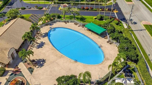 a view of a swimming pool with a lake view