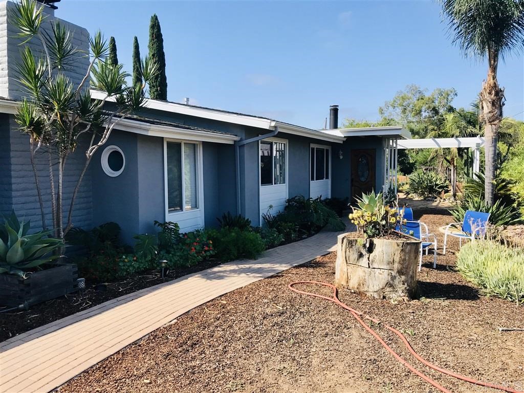 2617 Groton Place Escondido, CA 92025 - Photo 1 of 2 a view of a chair and table in backyard of the house