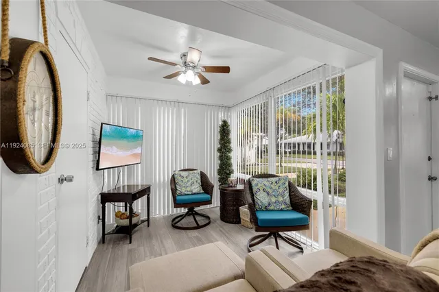 a living room with furniture and a window