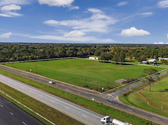 1305 State Highway West Winnie, TX 77665 - Photo 1 of 5 a view of a golf course with a park