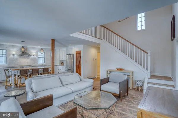 a living room with furniture and a couch