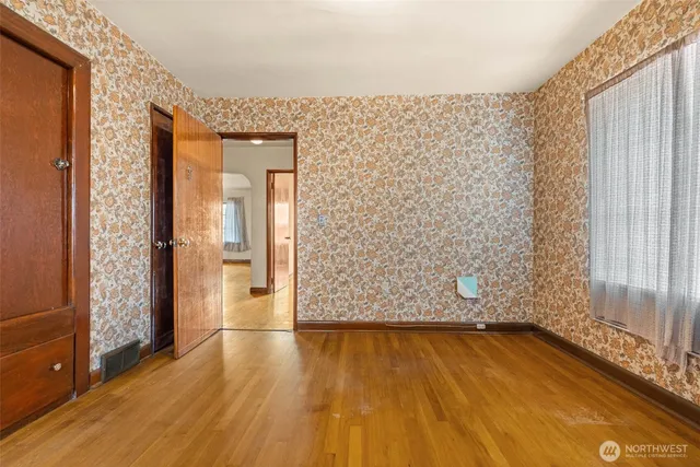 wooden floor in front of room with wooden floor