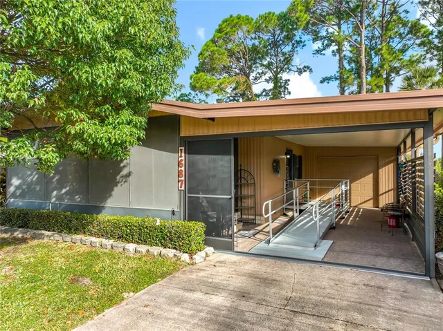 a view of a house with a patio