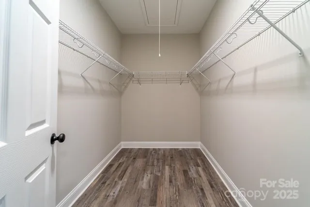 a view of a room with racks on the wall