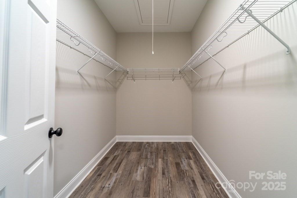 679 Firefly Road Whittier, NC 28789 - Photo 19 of 34 a view of a room with racks on the wall