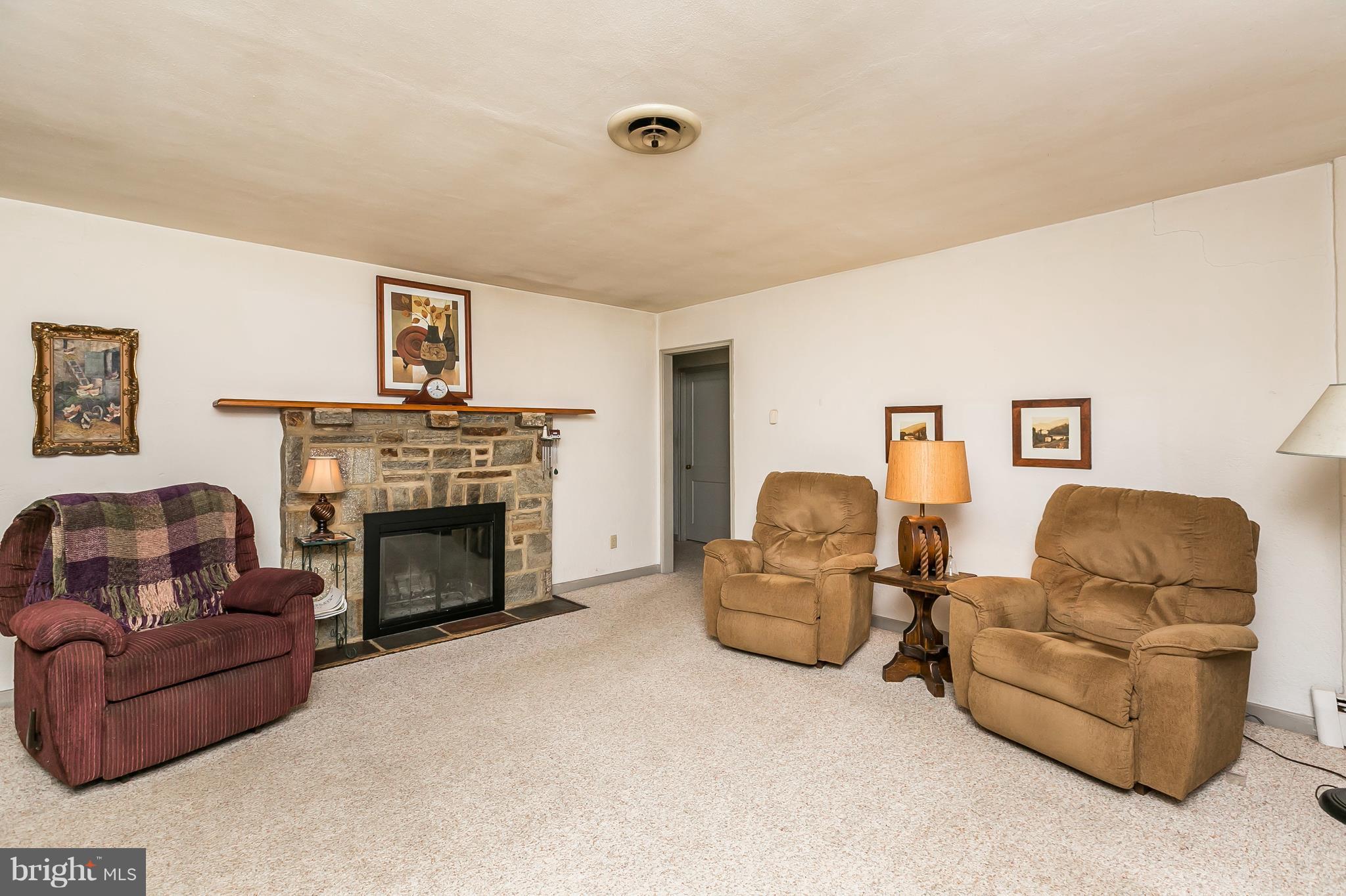 1660 St Margarets Road Annapolis, MD 21409 - Photo 3 of 20 Living Room with Wood Burning Fireplace