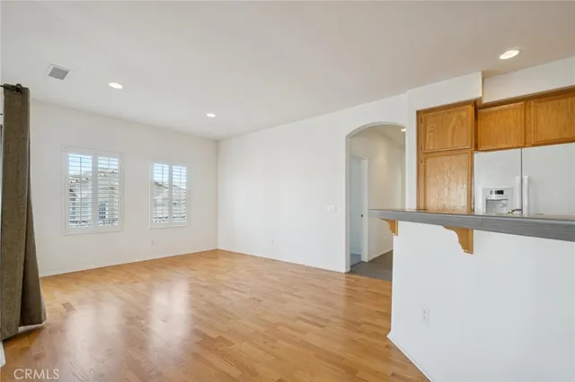 a kitchen with stainless steel appliances granite countertop a sink and a microwave