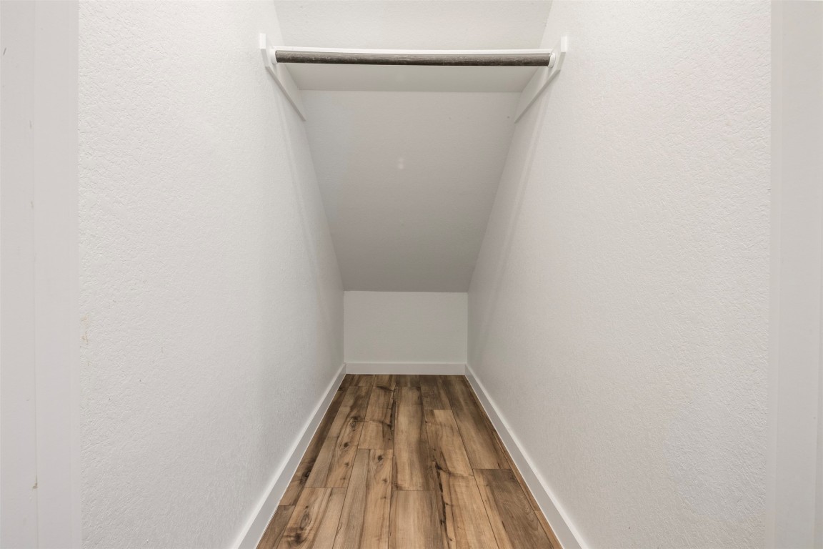 1506 King Rnch Road Conroe, TX 77301 - Photo 21 of 32 a view of empty room with wooden floor