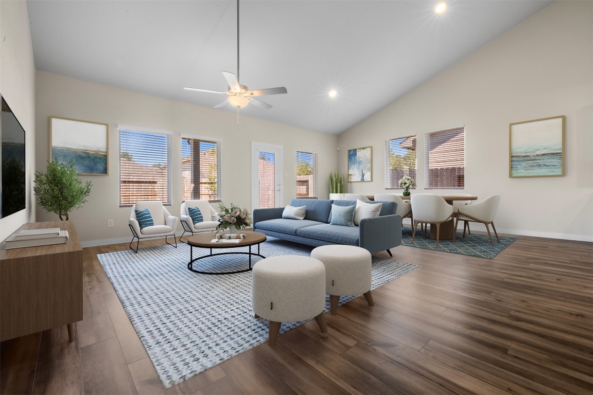 1506 King Rnch Road Conroe, TX 77301 - Photo 7 of 32 a living room with furniture or couch and a chandelier