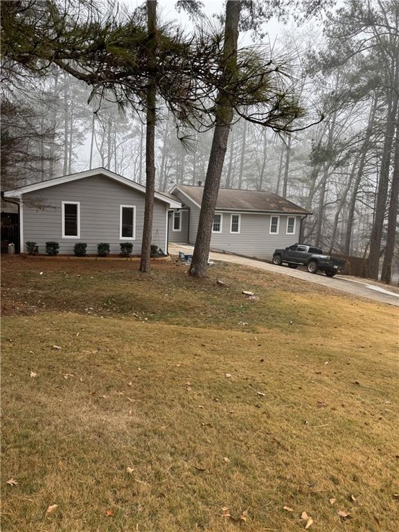 205 Tallow Roswell, GA 30076 - Photo 2 of 19 a house with a outdoor space