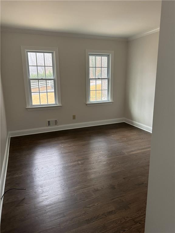 205 Tallow Roswell, GA 30076 - Photo 6 of 19 an empty room with wooden floor and windows