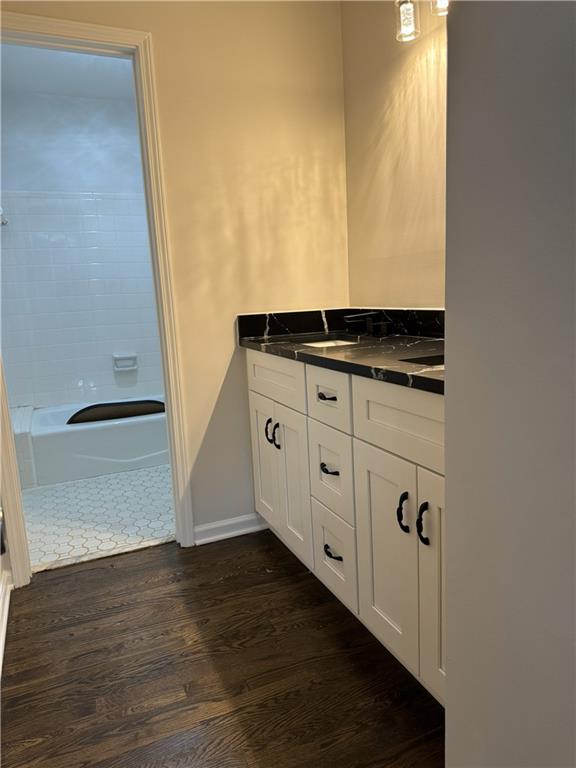 205 Tallow Roswell, GA 30076 - Photo 7 of 19 a kitchen with granite countertop white cabinets and sink